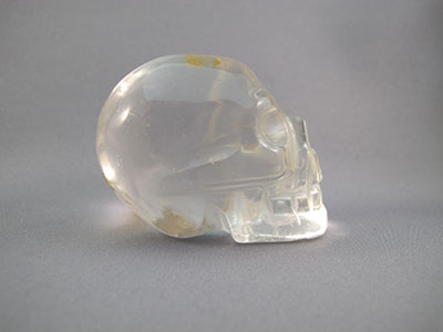 A-ASC-Q-M-125 : Adoption 2.25-Inch Hematoid Ascension Quartz Crystal Skull