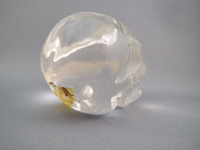 A-ASC-Q-M-125 : Adoption 2.25-Inch Hematoid Ascension Quartz Crystal Skull