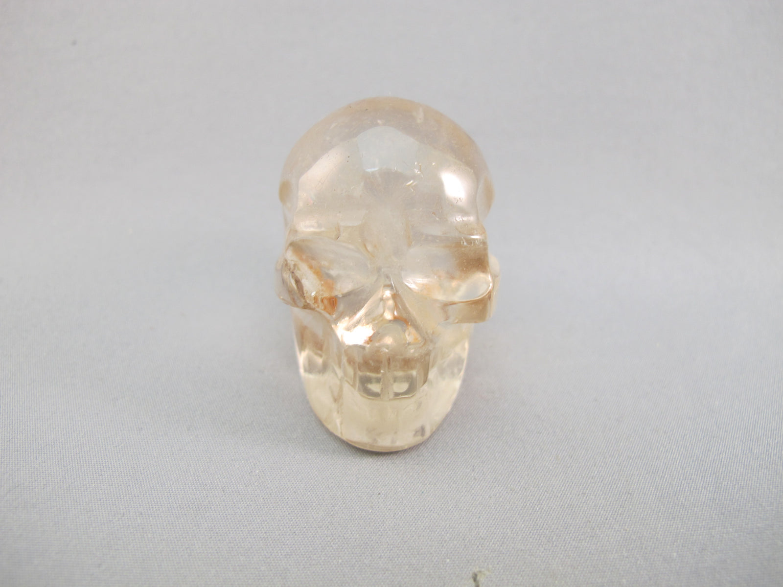 A-Q-S-83 :  Adoption 1.8-Inch Hematoid Quartz Crystal Skull