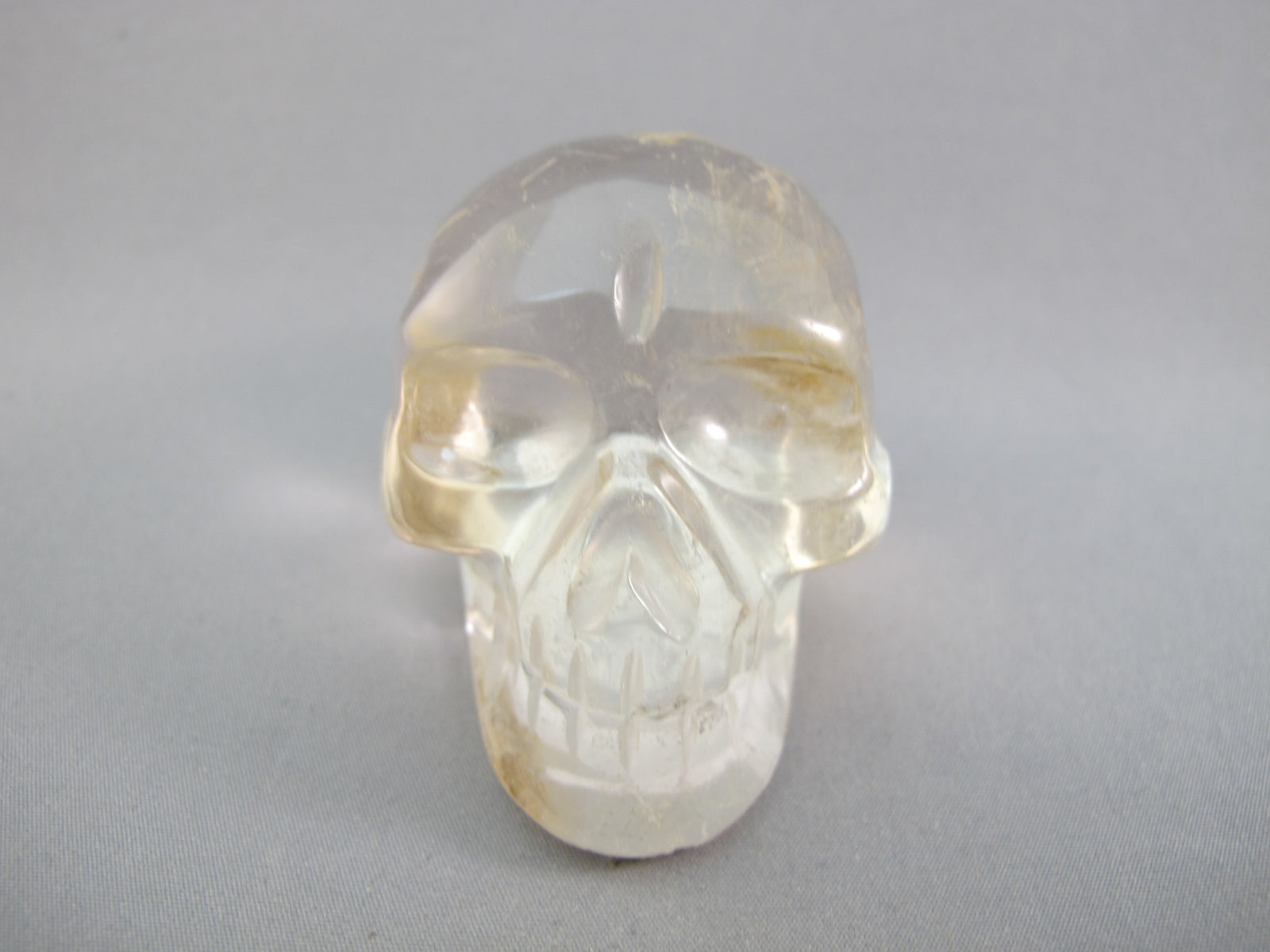 A-Q-M-167 : Adoption 2.6-Inch Hematoid Quartz Crystal Skull