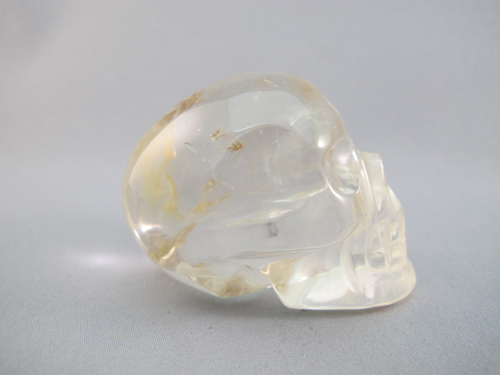 A-Q-M-167 : Adoption 2.6-Inch Hematoid Quartz Crystal Skull