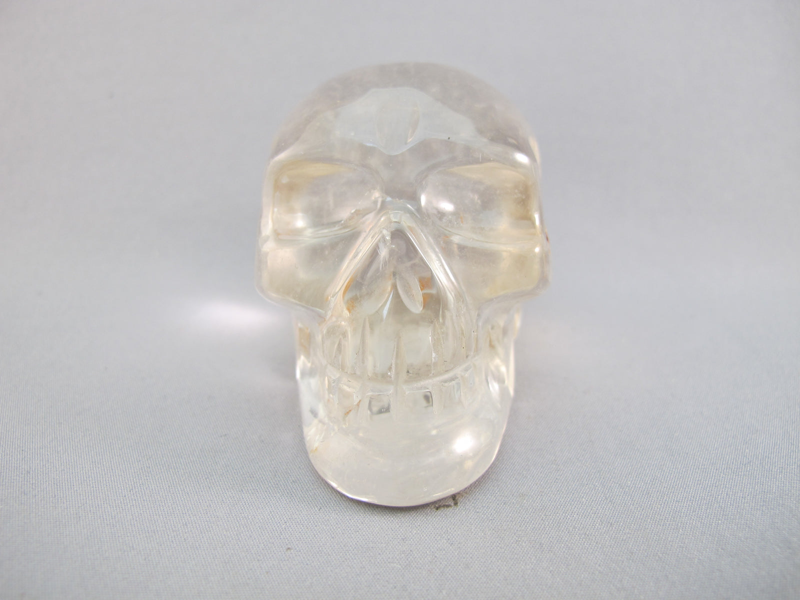 A-Q-M-250 : Adoption 3-Inch Hematoid Quartz Crystal Skull