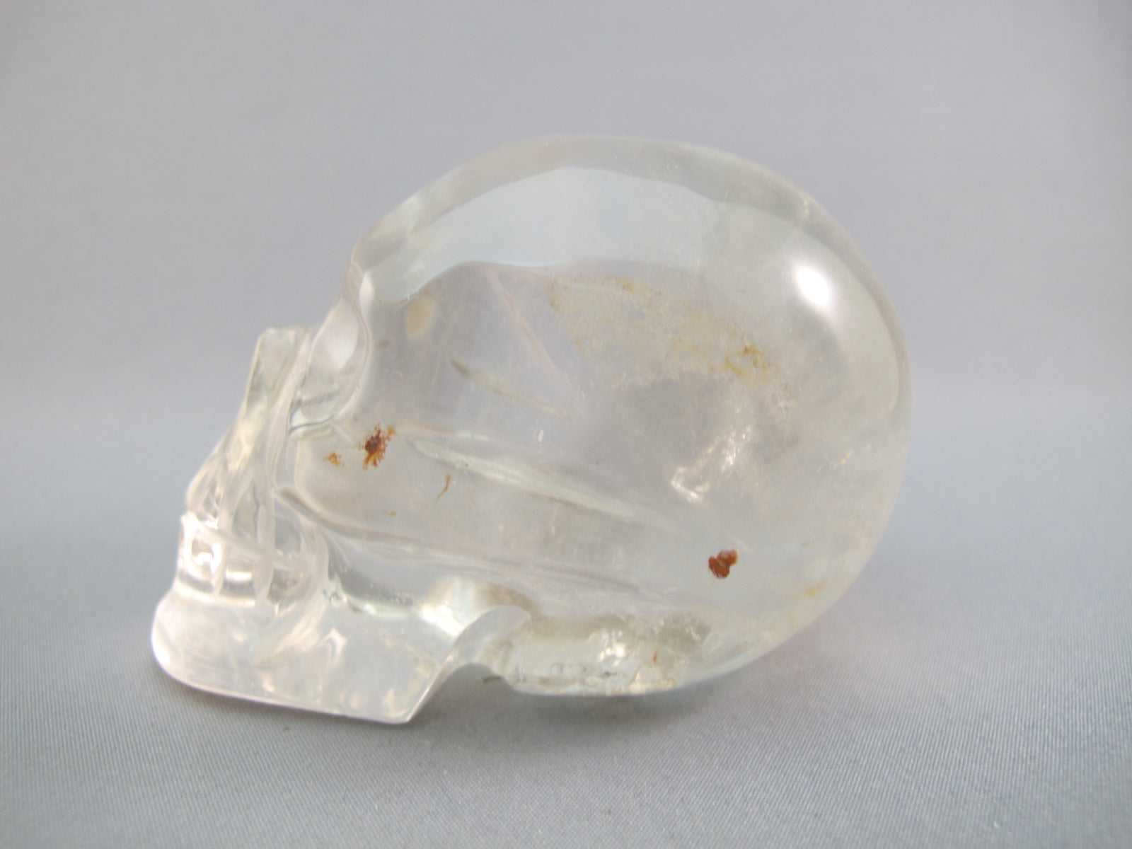 A-Q-M-250 : Adoption 3-Inch Hematoid Quartz Crystal Skull