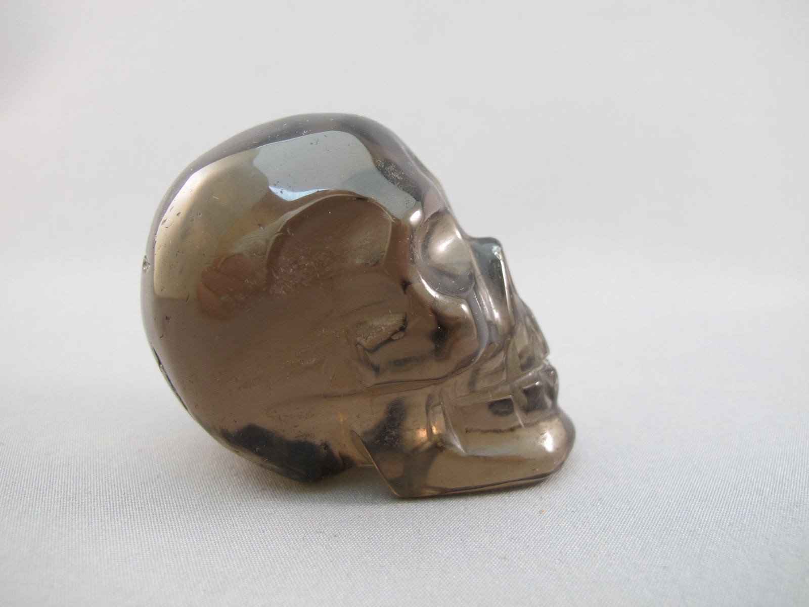 A-ASC-SQ-M-111 :  Adoption 2.1-Inch  Ascension Smoky Quartz Crystal Skull