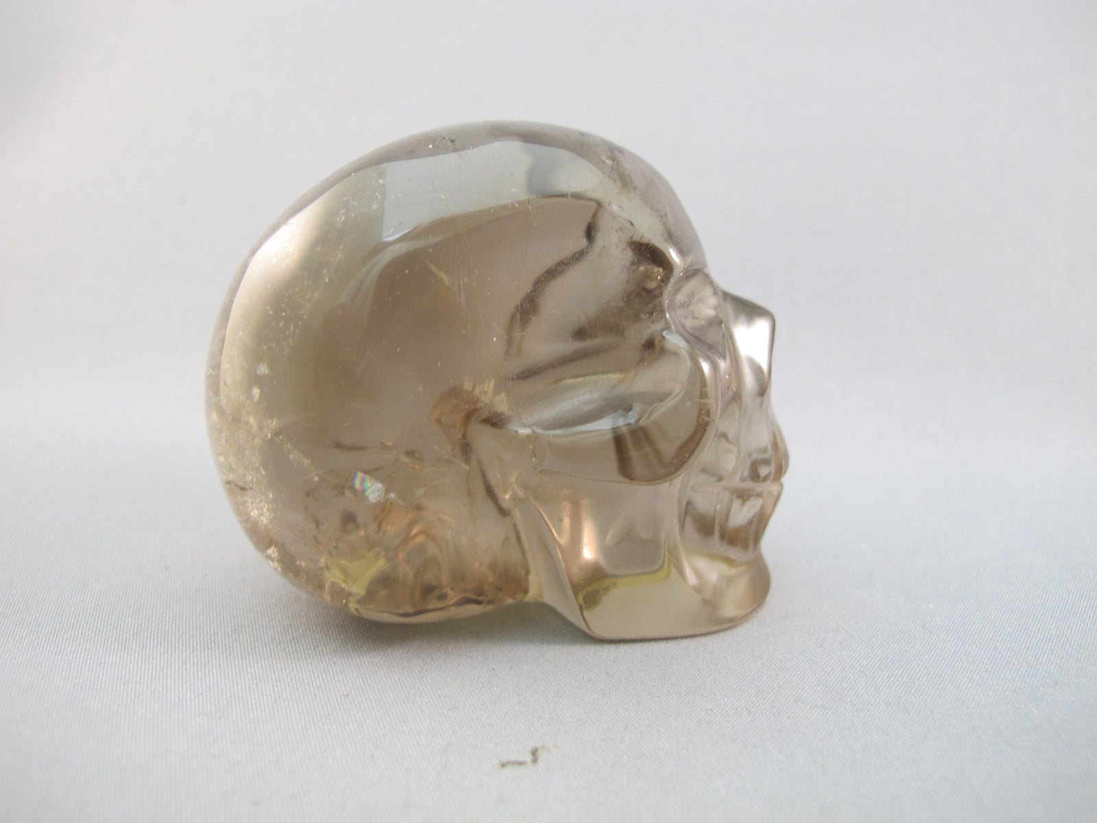 A-SQ-M-177-r : Adoption 2.4-Inch Rainbow Smoky Quartz Crystal Skull