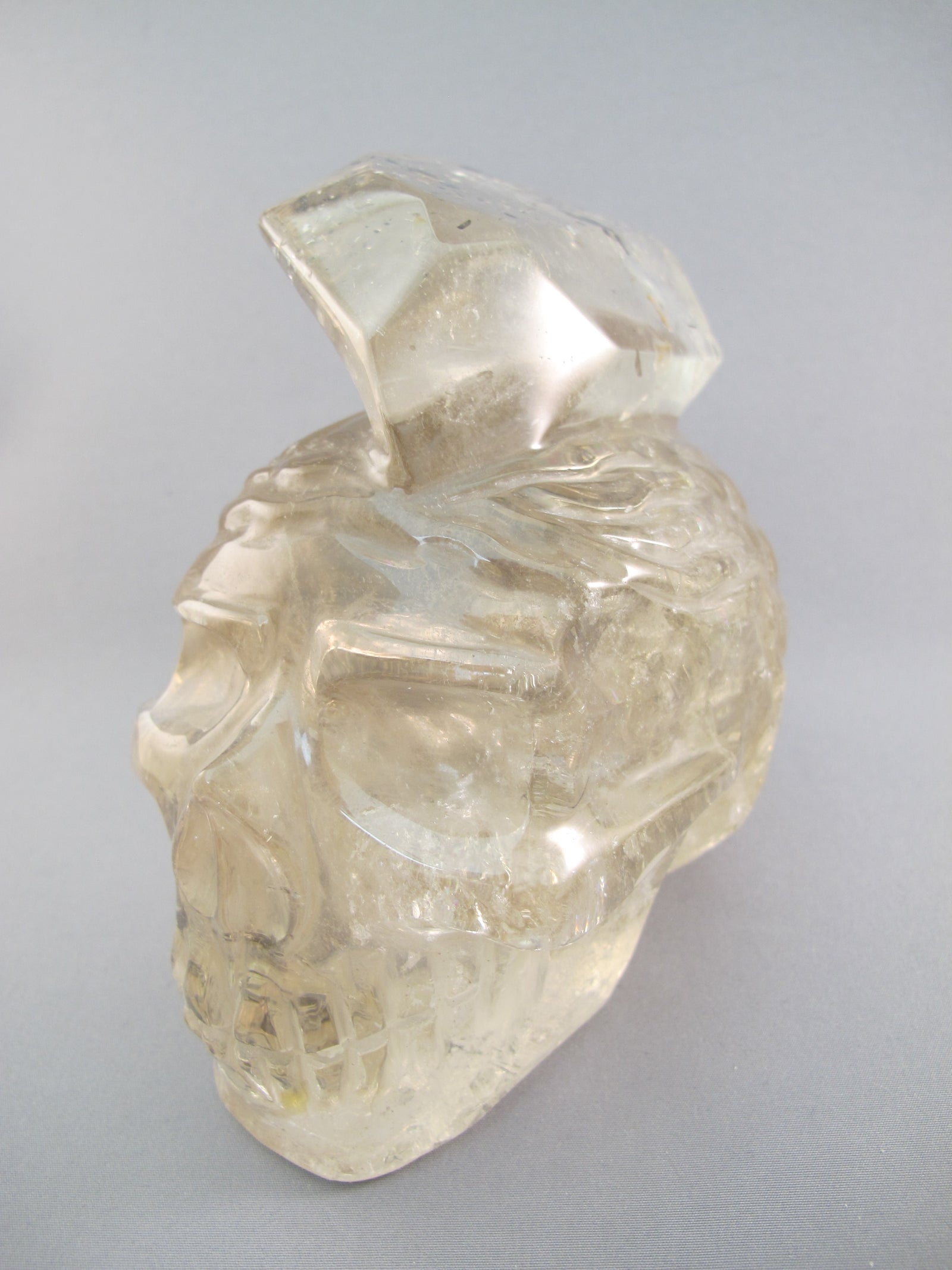 A-SQ-L-1404-r : Adoption 4.7-Inch Rutilated Smoky Quartz Crystal Skull