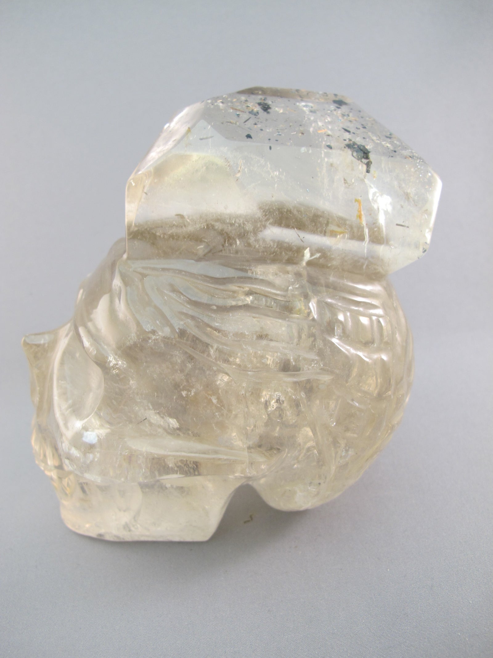 A-SQ-L-1404-r : Adoption 4.7-Inch Rutilated Smoky Quartz Crystal Skull