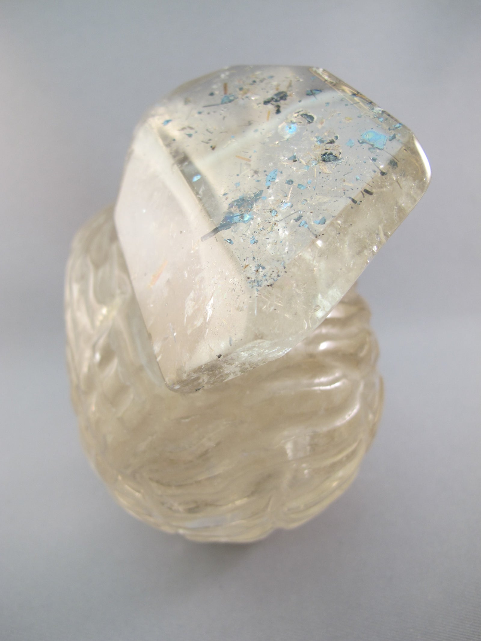 A-SQ-L-1404-r : Adoption 4.7-Inch Rutilated Smoky Quartz Crystal Skull
