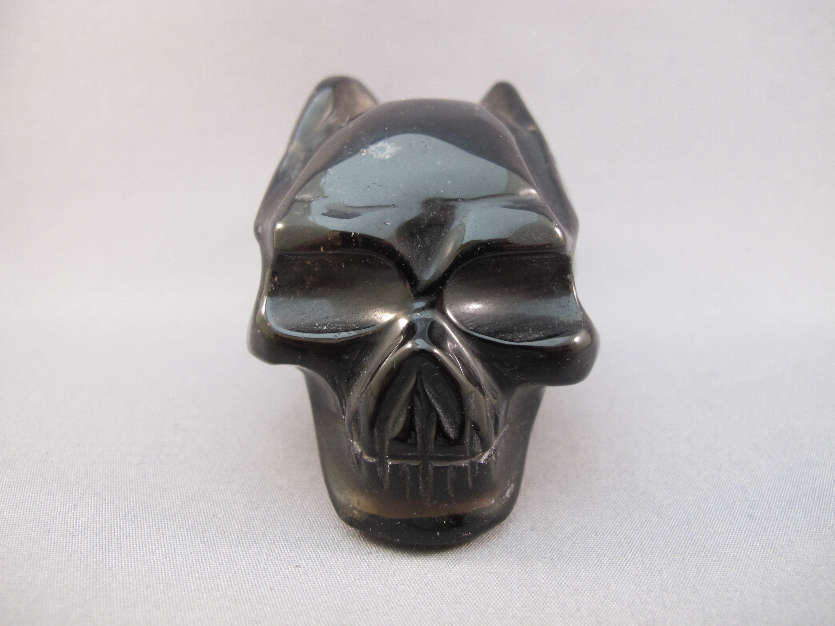 SQ-M-0239-w : 3.2-inch Winged Smoky Quartz Crystal Skull