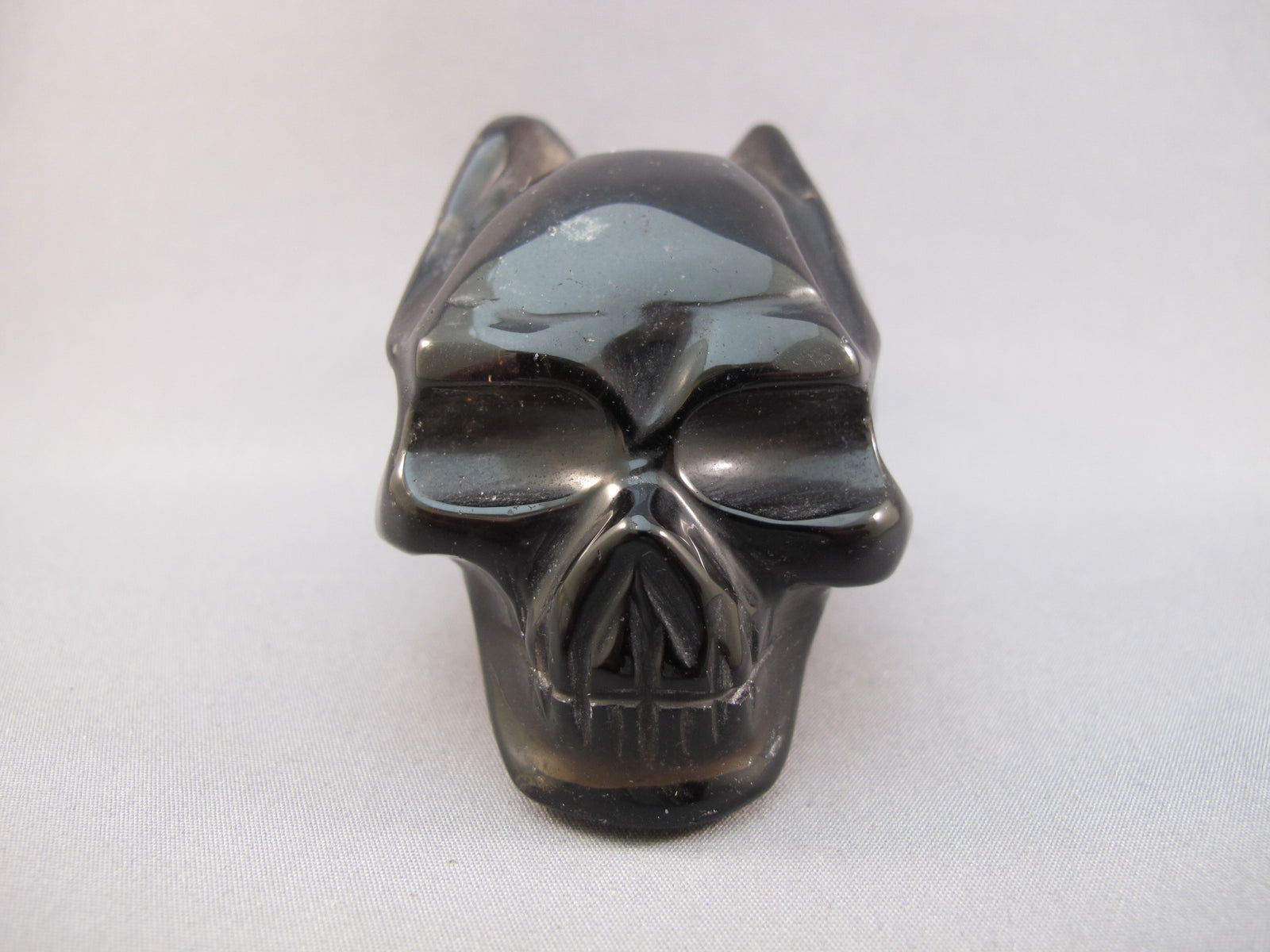 SQ-M-0239-w : 3.2-inch Winged Smoky Quartz Crystal Skull
