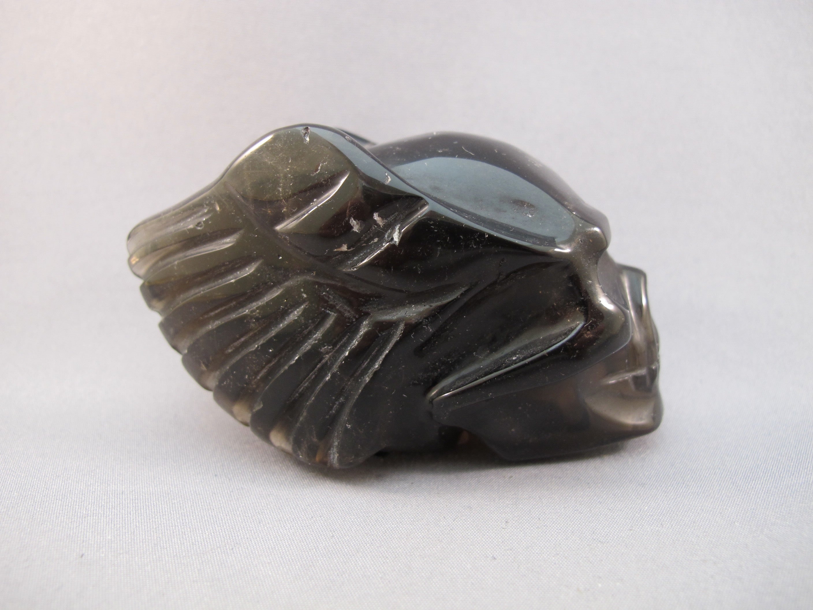 SQ-M-0239-w : 3.2-inch Winged Smoky Quartz Crystal Skull