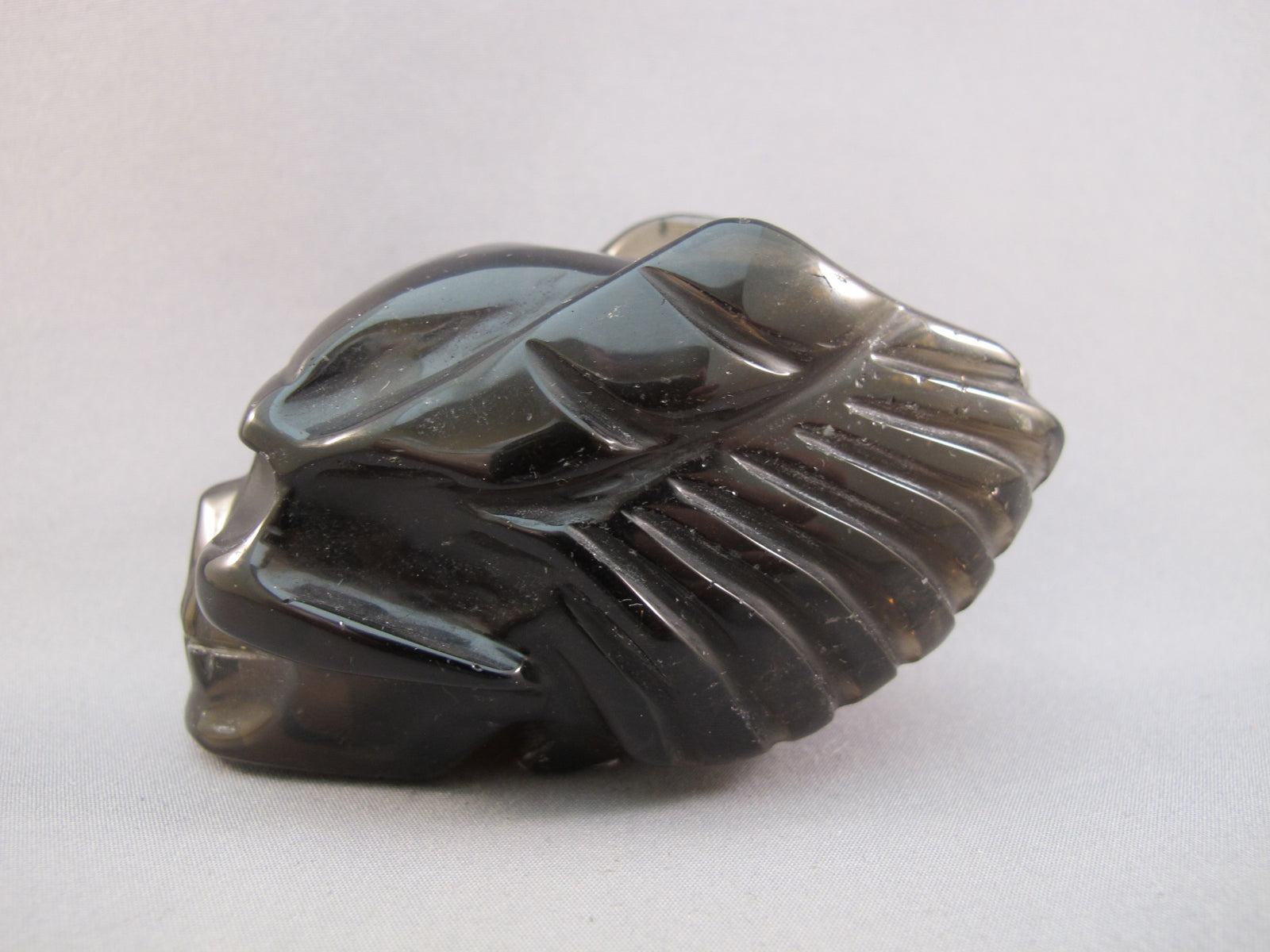 SQ-M-0239-w : 3.2-inch Winged Smoky Quartz Crystal Skull