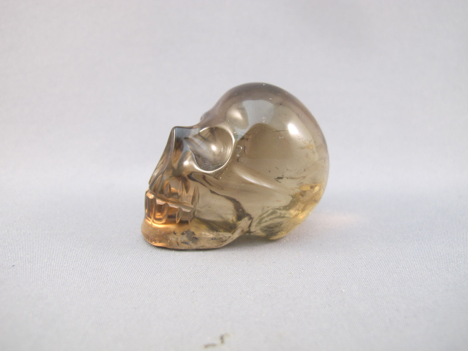 CS-SMQ-RBW-0062 :  1.7-inch Rainbow Smoky Quartz Crystal Skull