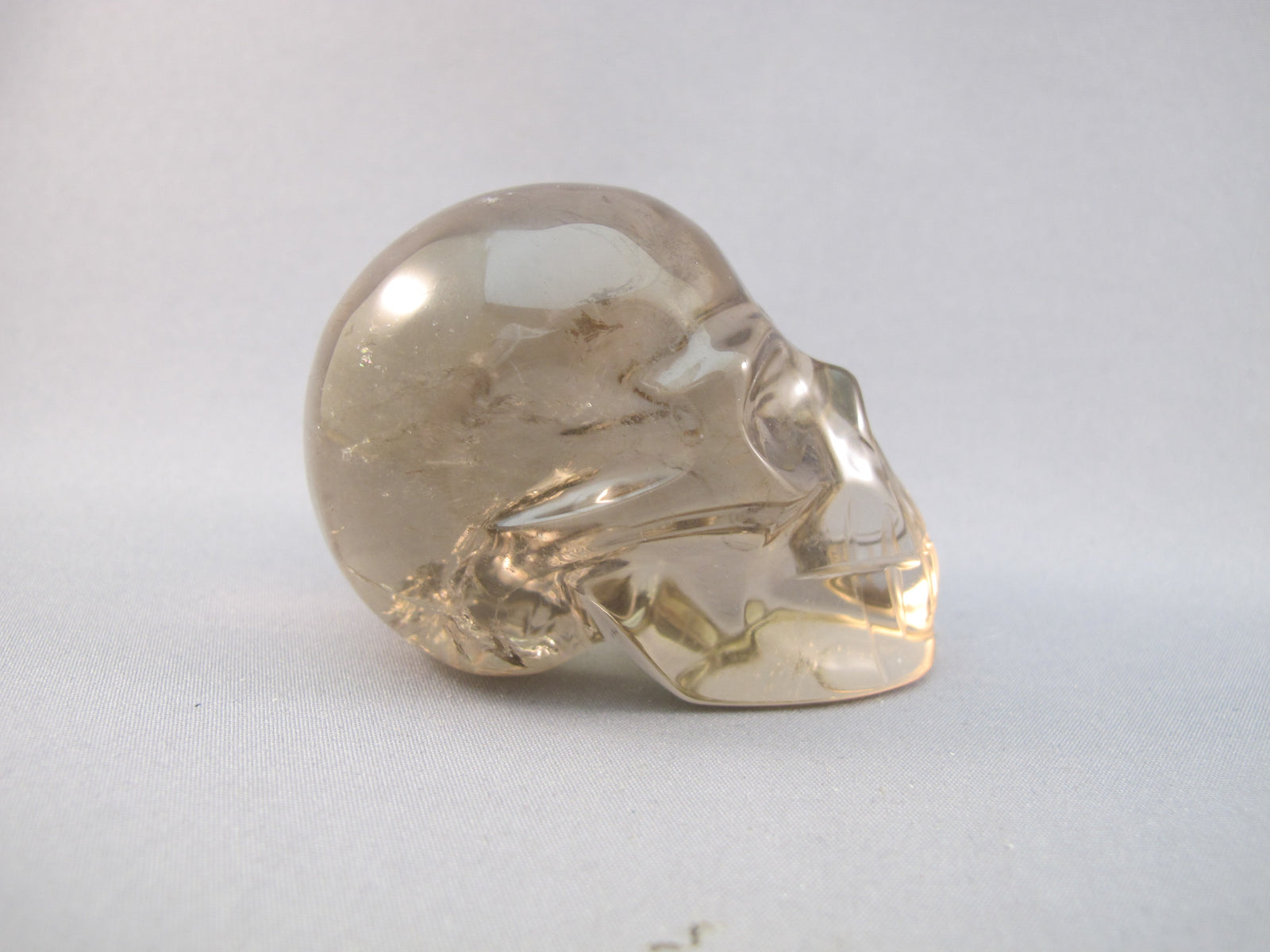 CS-SMQ-RBW-0129 :  2.4-inch Rainbow Smoky Quartz Crystal Skull