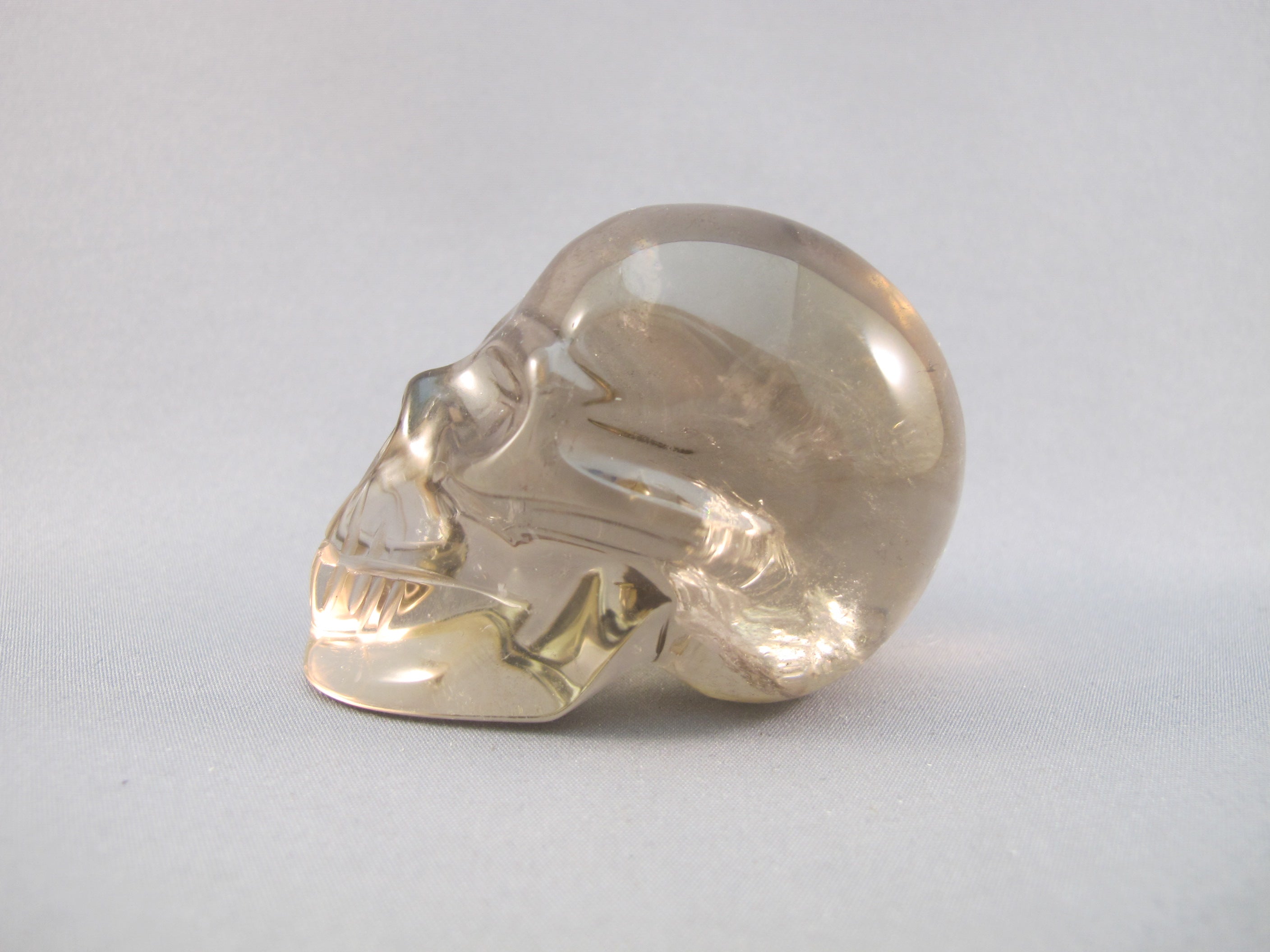 CS-SMQ-RBW-0129 :  2.4-inch Rainbow Smoky Quartz Crystal Skull