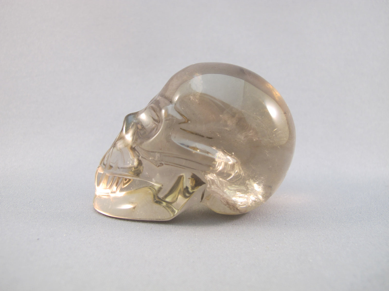 CS-SMQ-RBW-0129 :  2.4-inch Rainbow Smoky Quartz Crystal Skull