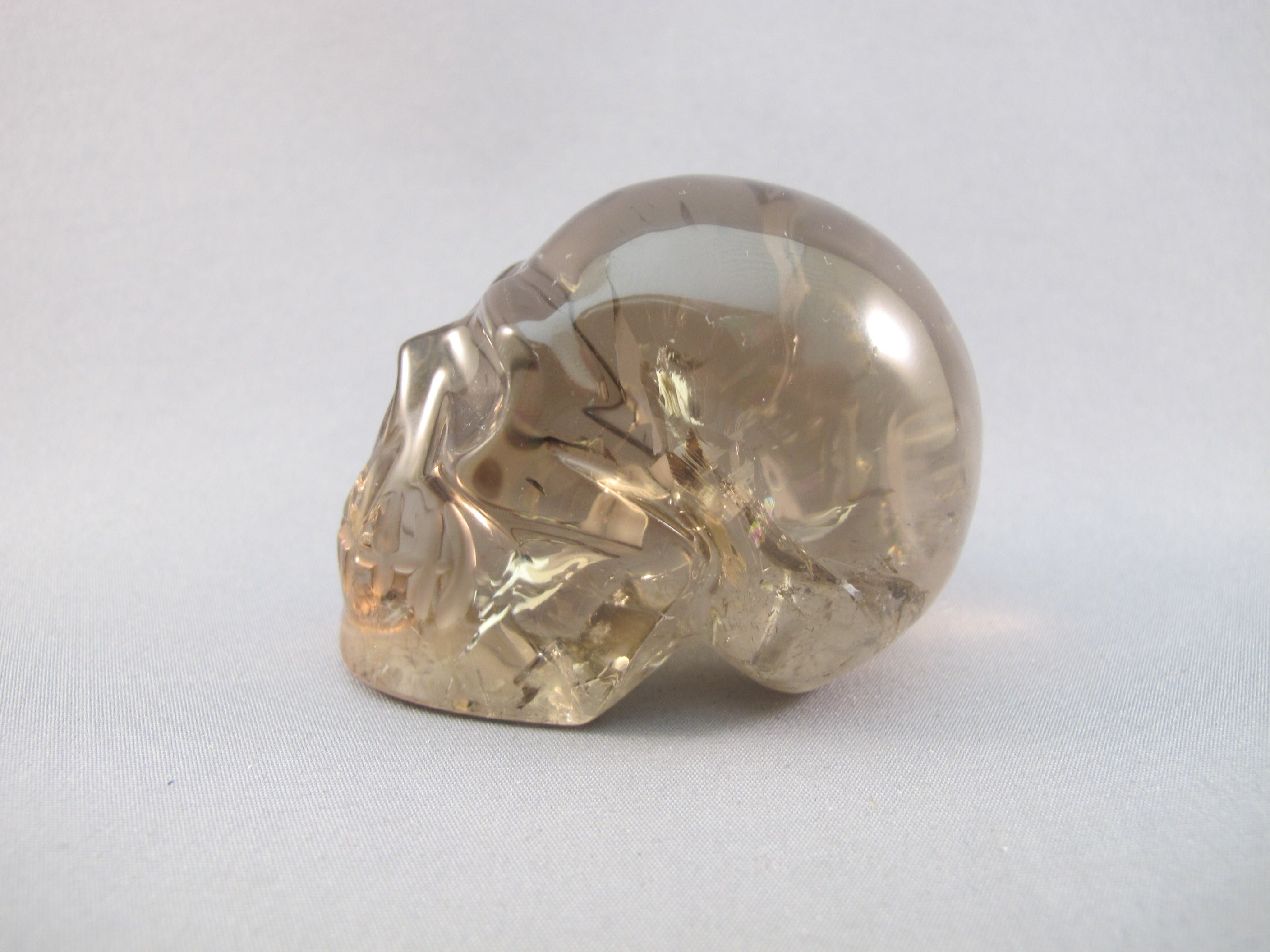 CS-SMQ-RBW-0151 :  2.4-inch Rainbow Smoky Quartz Crystal Skull