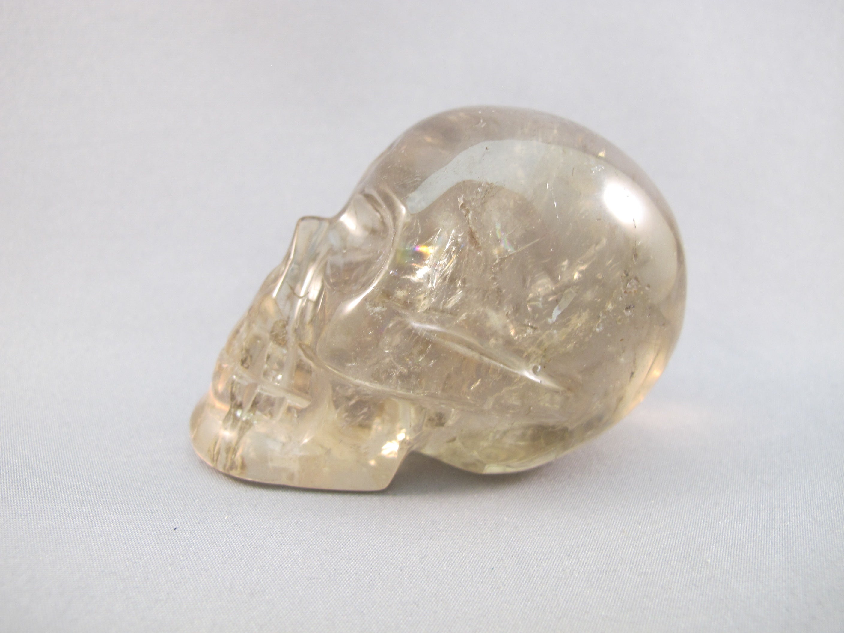 CS-SMQ-RBW-0200 :  2.9-inch Rainbow Smoky Quartz Crystal Skull