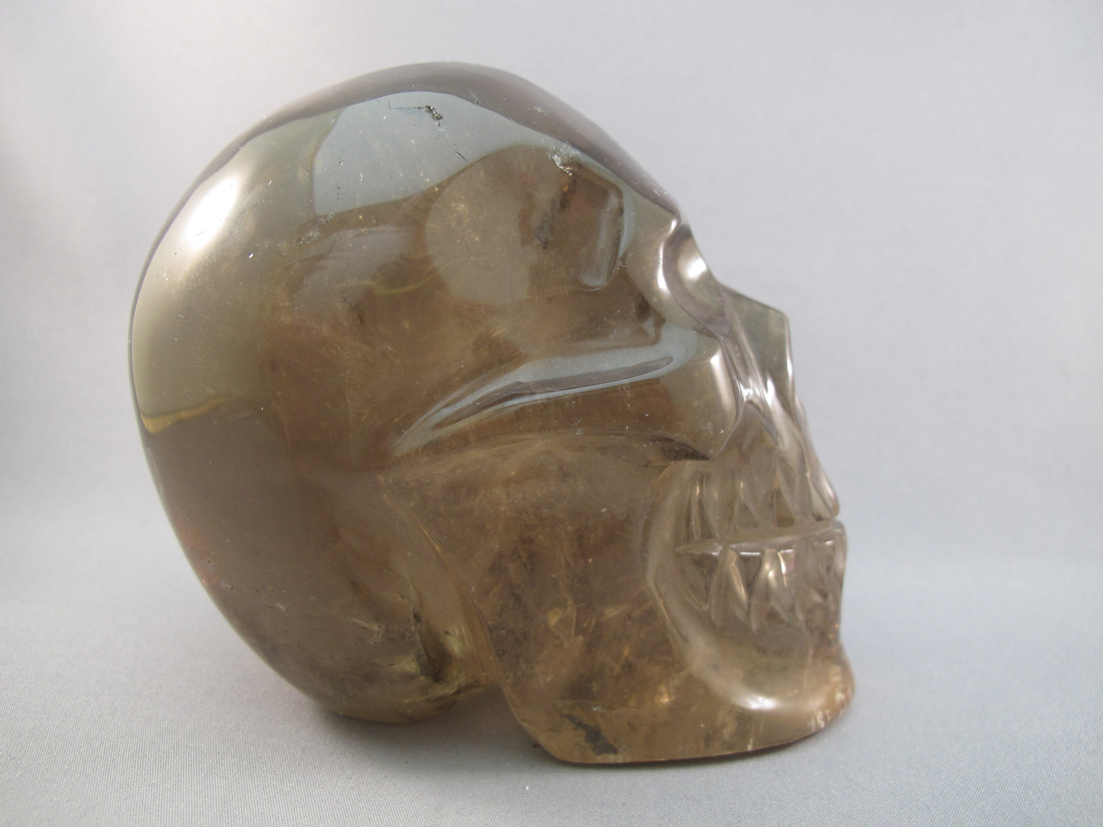 CS-SMQ-RUT-1263 :  4-inch Rutilated Smoky Quartz Crystal Skull