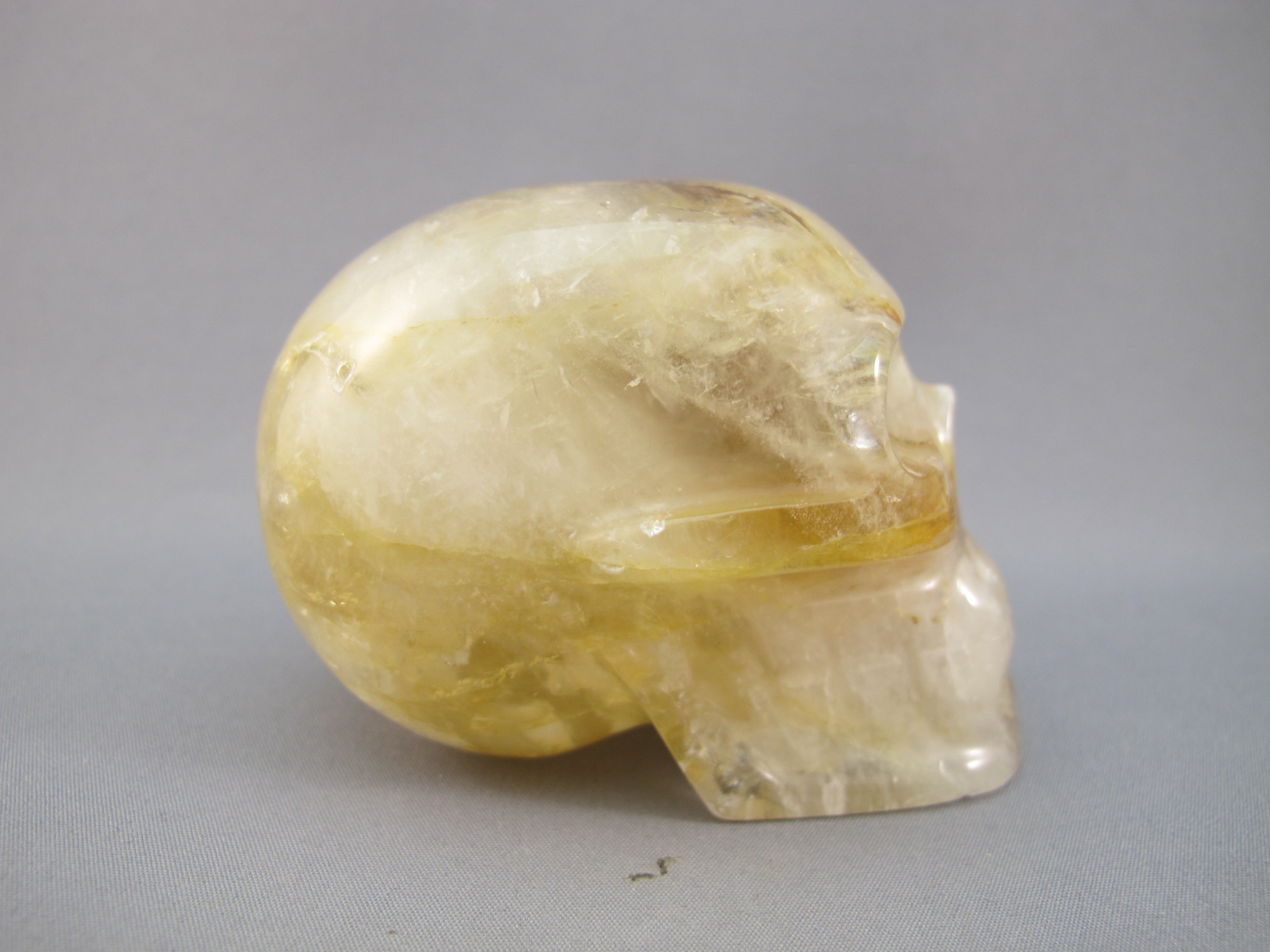CS-GDH-RBW-0234 :  2.9-inch Rainbow Golden Healer Crystal Skull