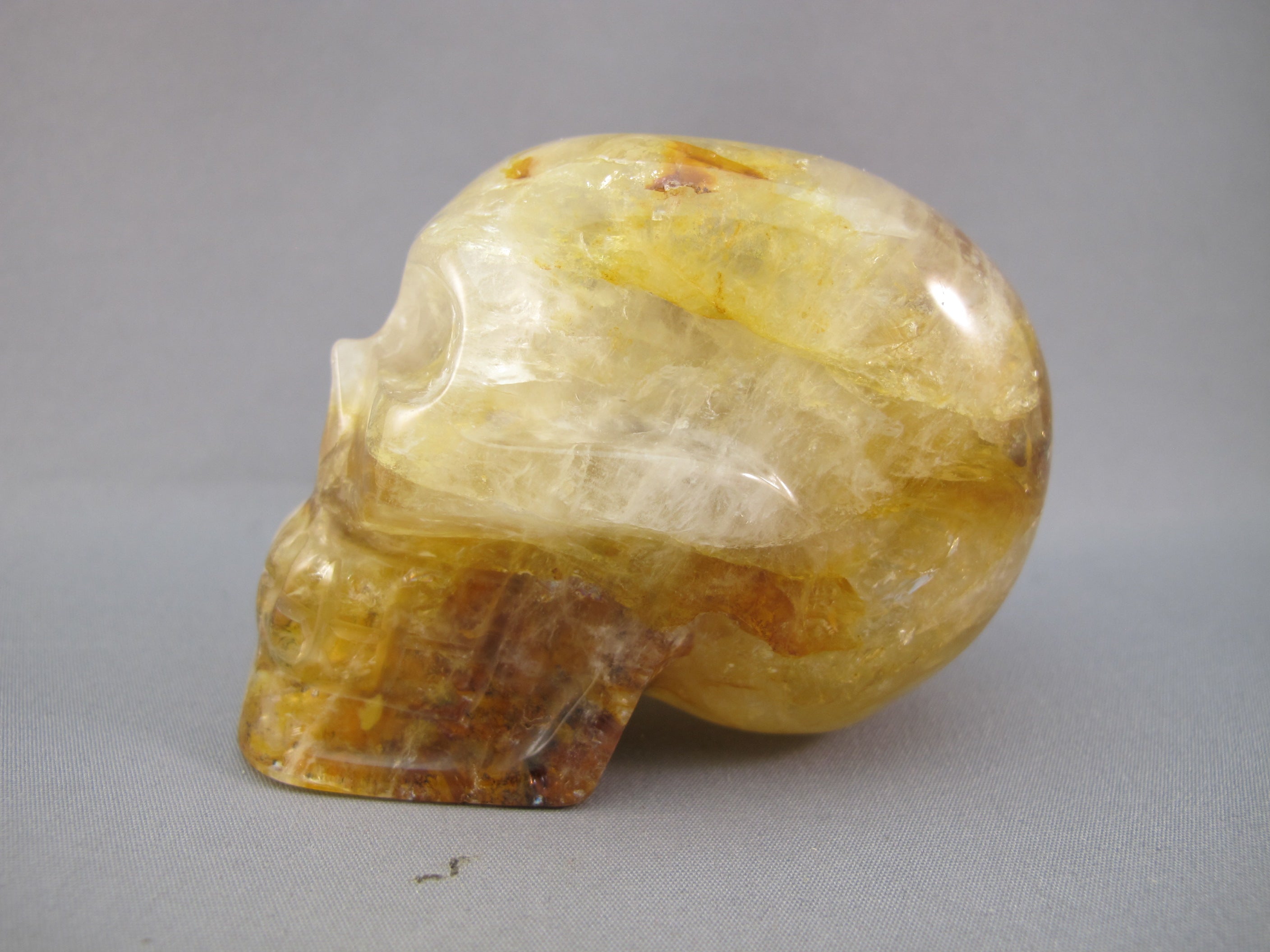 CS-GDH-RBW-0234 :  2.9-inch Rainbow Golden Healer Crystal Skull