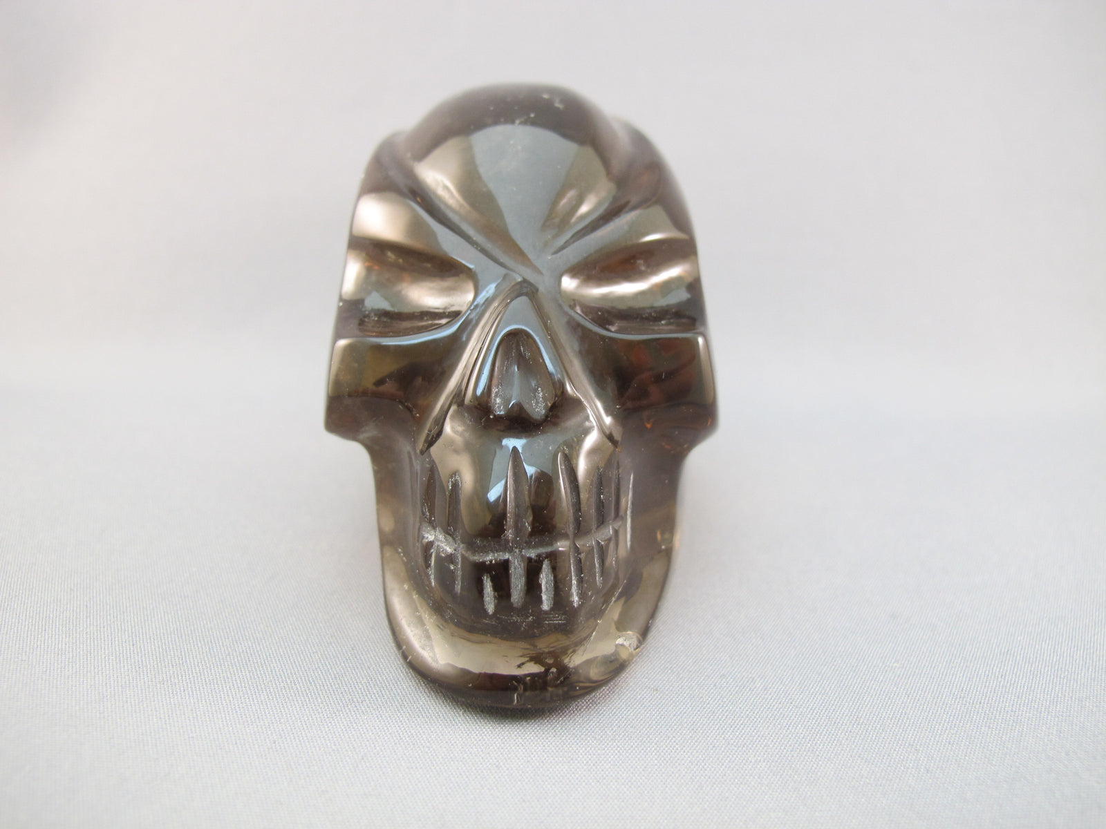 SQ-T-365 : Smoky Quartz Traveler Crystal Skull