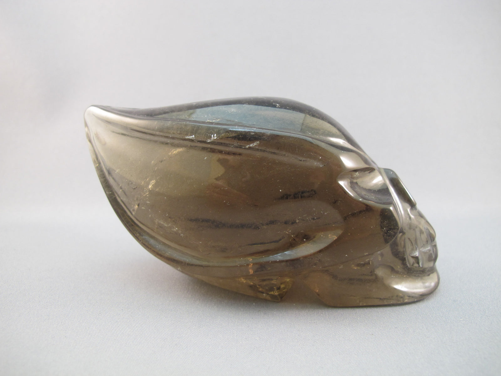 SQ-T-365 : Smoky Quartz Traveler Crystal Skull