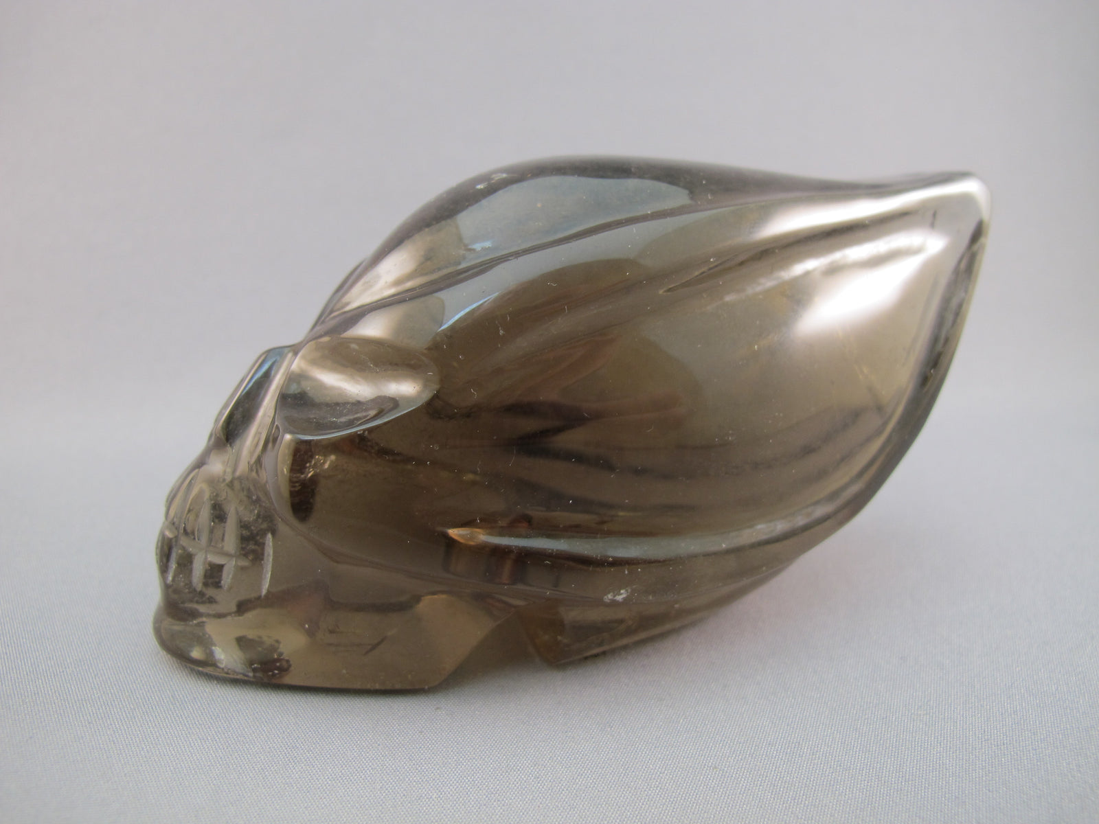 SQ-T-365 : Smoky Quartz Traveler Crystal Skull