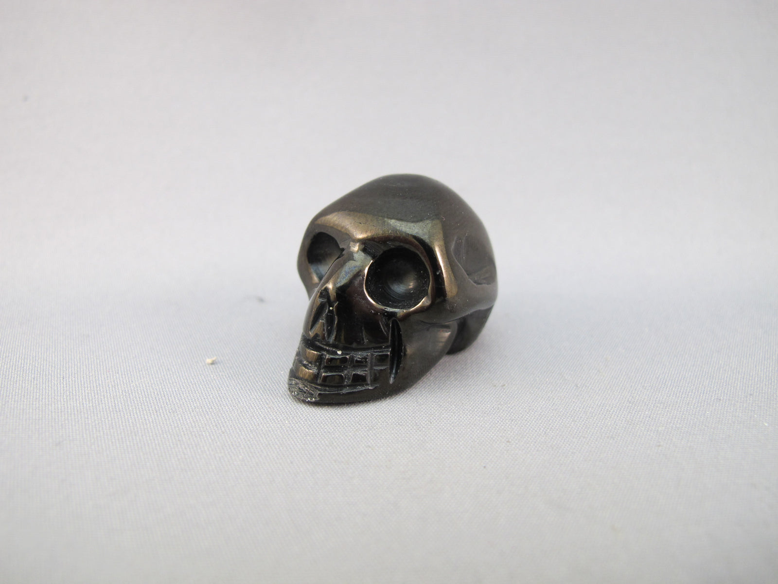 A-JM-S-10 : Adoption Metallic Jet Crystal Skull (Copy)