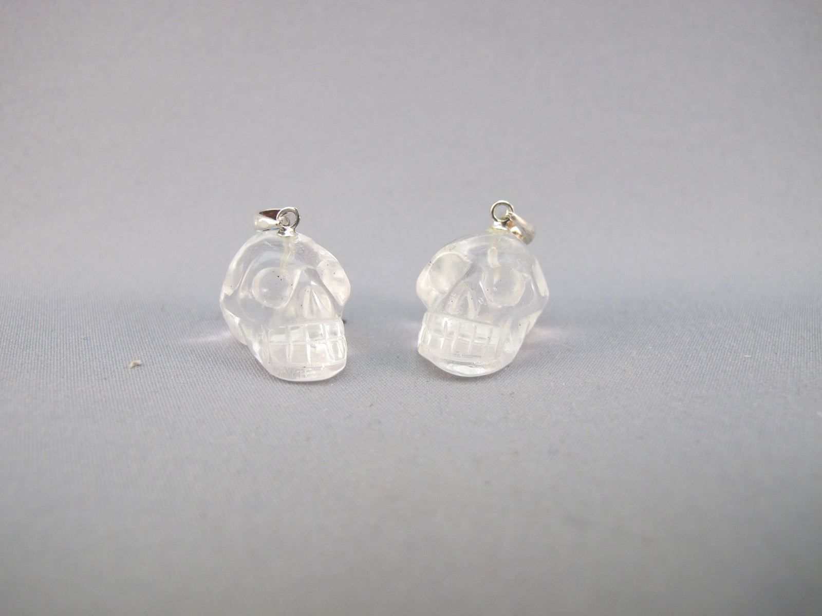 A-SP-1-Q-s : Adoption 2-for-1 Real Quartz Crystal Skull Small Pendant