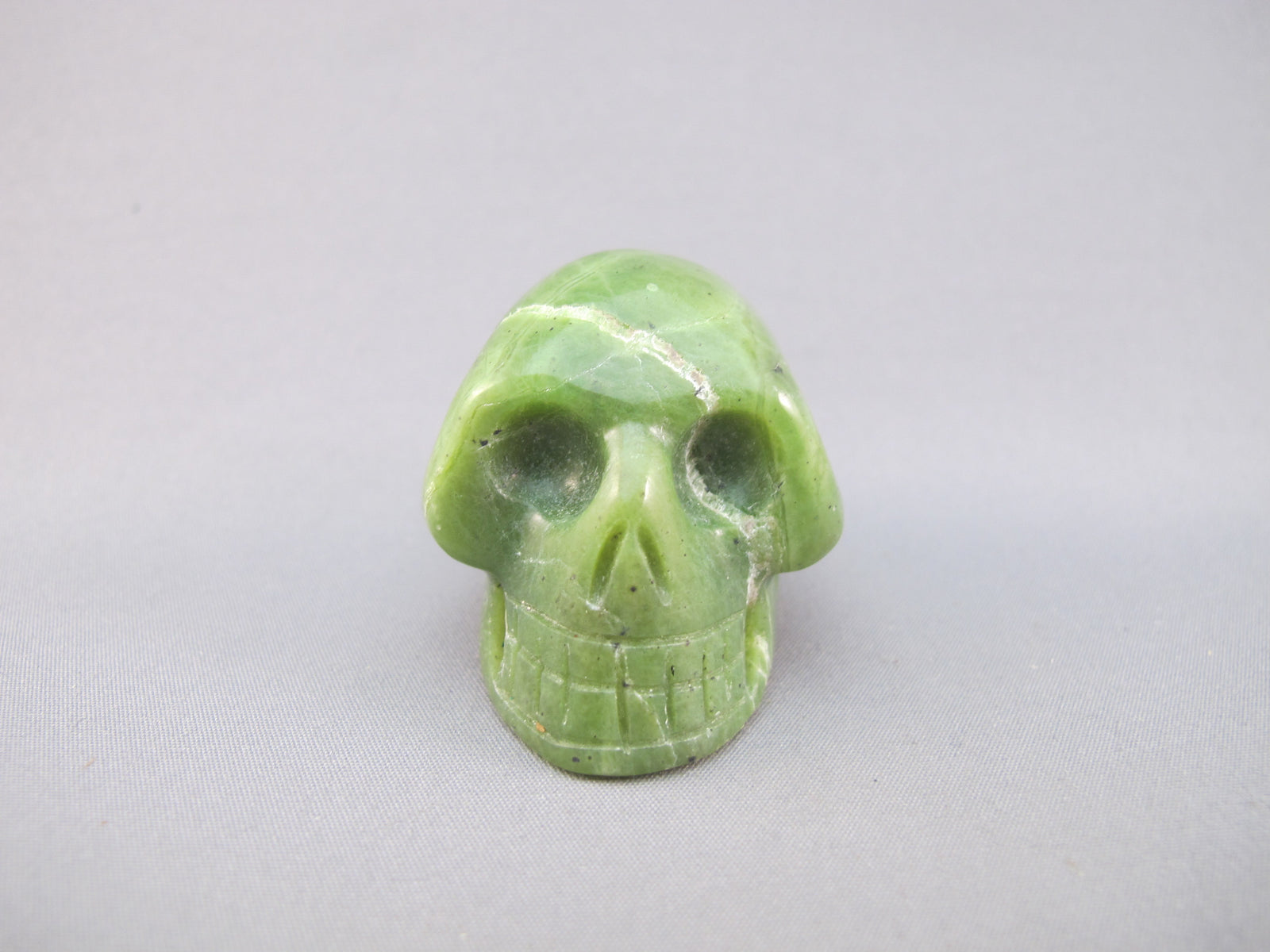 A-J-S-60 : Adoption Green Nephrite Jade Crystal Skull