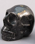 N-S-60-r : Red-Flash 1.5" Nuummite Crystal Skull