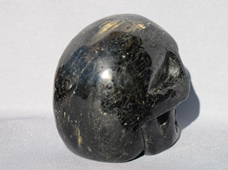 N-M-400-g-a : Gold-Flash Nuummite Crystal Skull