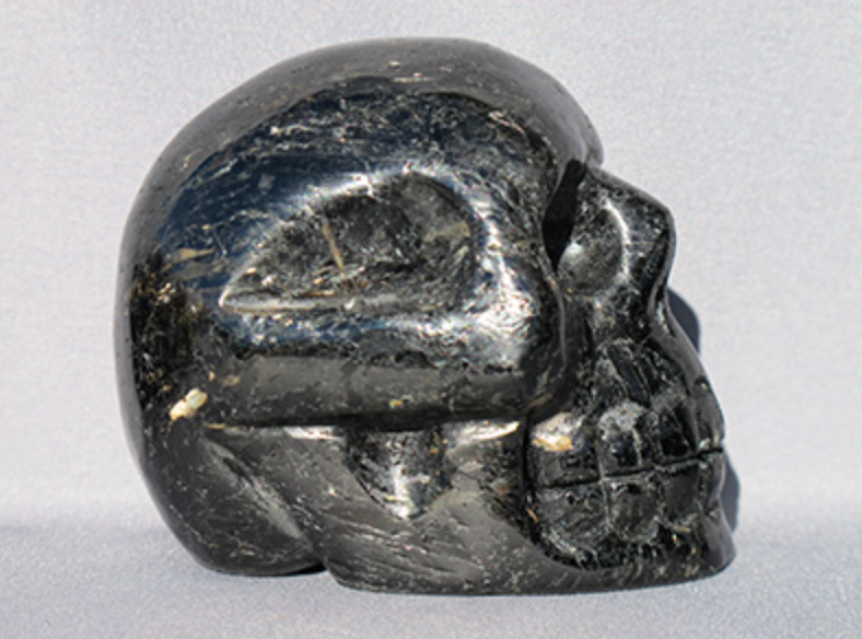 N-M-400-g-a : Gold-Flash Nuummite Crystal Skull