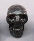 N-S-20-r : Red-Flash 1" Nuummite Crystal Skull