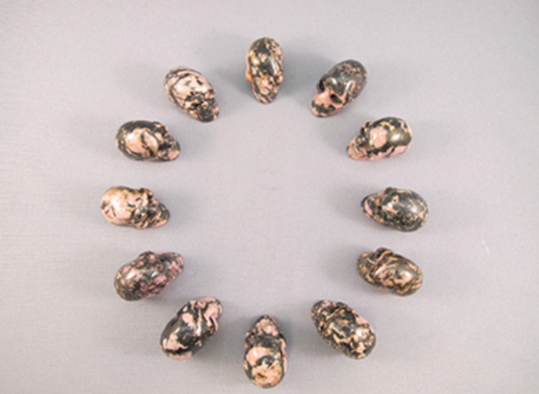 CS-12-RH-15 : Rhodonite 12 Crystal Skulls Set