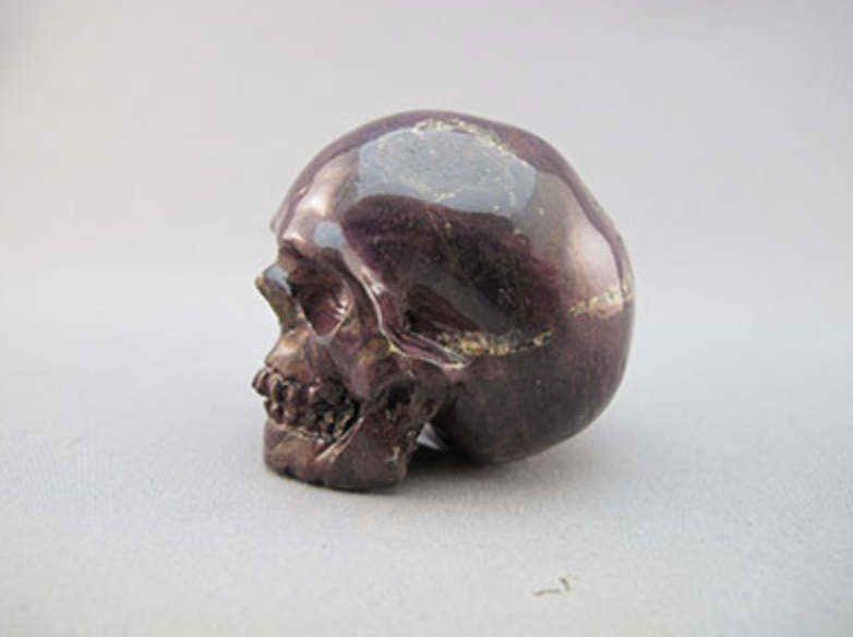 PPW-M-085 : Purpurite with White Crystal Skull
