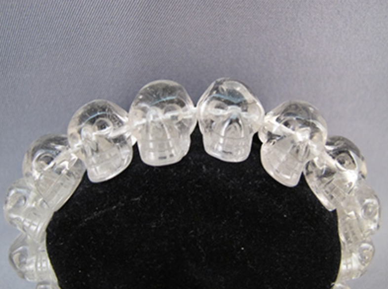 J-B-Q-ASC : Ascension Quartz Crystal Skull Bead Bracelet