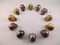 CS-12-TE-r : Rainbow Tiger Eye 12 Crystal Skulls Set