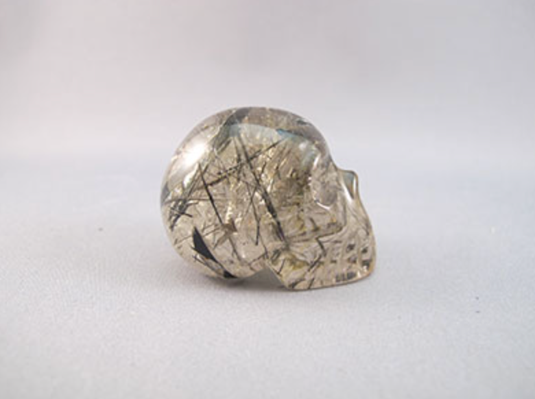 BTQ-S-40 : Tourmalinated Smoky Quartz Crystal Skull