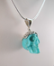 J-SS-T-7.6-s : Scrolled Sterling Silver Turquoise Crystal Skull Pendant