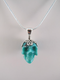 J-SS-T-9.6-s : Scrolled Sterling Silver Turquoise Crystal Skull Pendant