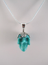 J-SS-T-9.6-s : Scrolled Sterling Silver Turquoise Crystal Skull Pendant