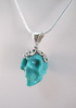 J-SS-T-9.6-s : Scrolled Sterling Silver Turquoise Crystal Skull Pendant