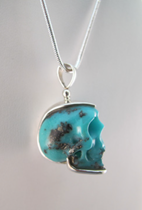 J-SS-T-16 : Sterling Silver Campitos Turquoise Crystal Skull Pendant