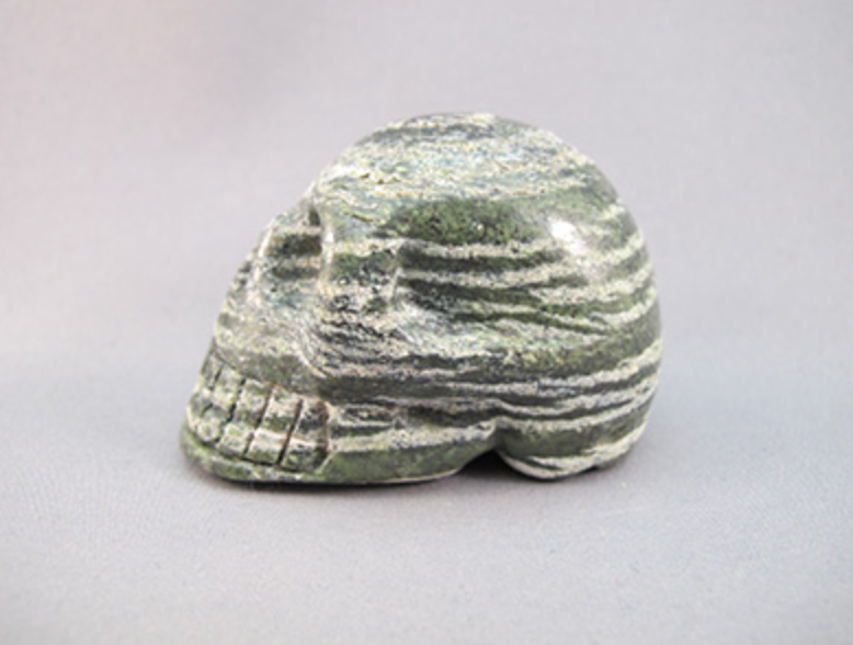 GZJ-S-135-h : Horizontal Green Zebra Jasper Crystal Skull