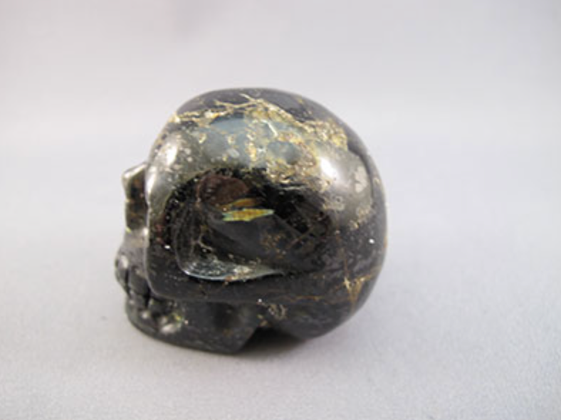 N-M-150-x : Matrix 2" Nuummite Crystal Skull
